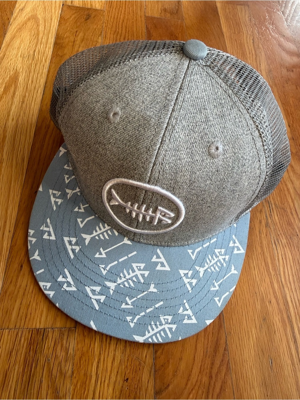 Gray Trucker Snapback Hat with Patterned Blue Brim